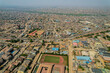 © AmazingAerialAgency - Aerial view of urban Lagos with expansive rooftop development, Lagos State, Nigeria.