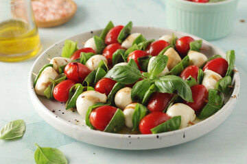 Wall Mural - A plate with Italian salad caprese canape