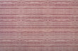 Rote horizontale Maserung - Muster einer Wandverkleidung in Nahaufnahme