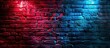 A brick wall illuminated by vivid red and blue neon lights, creating a striking visual contrast.