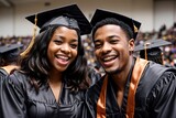 Fototapeta  - Two graduates in caps and gowns celebrating their academic success at a graduation ceremony