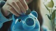 Close up young female putting coin in piggy bank Woman saving money for household payments utility bills calculating monthly family budgets making investments or strategy for personal  : Generative AI