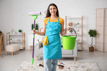 Sticker - Young woman with mop and bucket in living room after party