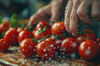 Hand grabbing tomatoes from pile on the table, fresh organic healthy food