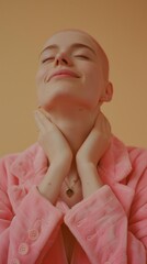 Wall Mural - A minimalist style portrait with a woman in a pink jacket holding her neck