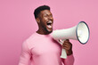 African young Businessman holding megaphone make loud noise on pastel background