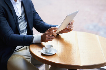 Fototapete - Businessman, outdoor and hands on tablet at cafe reading news, article or internet research. Online, communication and coffee break with tech for social media, networking and scroll blog on website