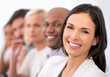 © Y.A./peopleimages.com - Portrait, smile and leader with team of business people in a row together at office. Face, group and happy woman, entrepreneur or professional consultant coworking in collaboration with employees