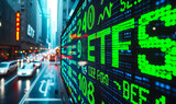 Fototapeta Londyn - Digital screen showcasing ETFs (Exchange Traded Funds) performance with dynamic green arrows indicating growth in the stock market