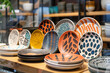 A display of hand-painted ceramic plates arranged like a work of art in a trendy homeware store.