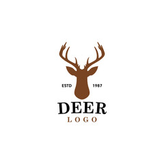 Poster - Deer Head and Horns Silhouette Logo Isolated On White Background