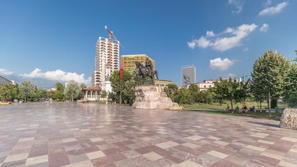 Wall Mural - Panorama showing the Skanderbeg memorial and Ethem Bey mosque on the main square in Tirana timelapse, Albania