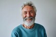 Happy mature old bearded man with dental smile, cool mid aged gray haired older senior hipster wearing blue sweatshirt standing isolated on white background looking at camera, headshot, Generative AI