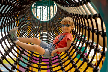 Sticker - Happy children, boys, playing on playground in Tel Aviv, israel on hot summer day