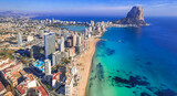 Fototapeta Na drzwi - Costa Blanca, Spain. Aerial drone panoramic view of coastal city Calpe with great beaches. Alicante province.
