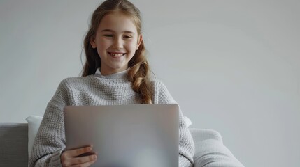 Poster - Cheerful Caucasian woman on portable computer surfing internet in casual wear, sitting in armchair and using laptop against white studio wall.