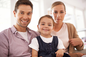 Wall Mural - Portrait, family and happy kid with parents in home for bonding, love and relax together. Face, mother and father with girl in living room for relationship and care of child for connection in house