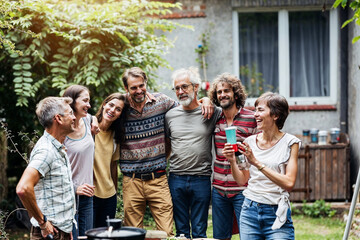 Family Enjoying Backyard Barbecue