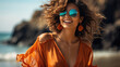 © AstraNova - Happy smiling woman on beach with wavy hair wearing dark orange aquamarine floral patterned shirt and stylish sunglasses with dynamic optimistic attitude