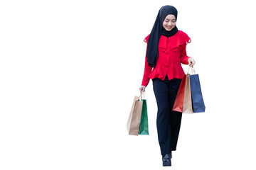 happy muslim arab lady happy enjoy shop in shopping walking street hand holding many paper shopping bag