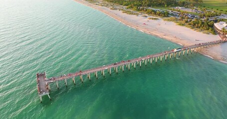 Canvas Print - Venice, Florida. Seaside summer activities. Aerial view of many tourists enjoying vacation time on fishing pier