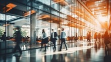 Business Workplace With People Walking In Blurred Motion In Modern Office Space