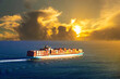 Container ship at sunset