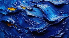 A Close Up Of A Blue And Yellow Painting With Drops Of Water On The Paint And A Gold Fish On The Bottom Of The Paint And Bottom Of The Painting.