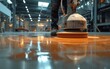 A person is using a machine to clean the floor efficiently and effectively