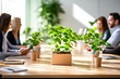© Garnar - Green plants in eco-friendly pots made from recycled materials on a conference table during an office employee meeting. Concept of corporate sustainability, clean working environment