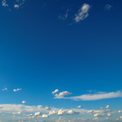 Sticker - White clouds on blue sky.