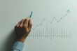 © AiHRG Design - A skilled hand transforms simple office supplies into a visual representation of data through precise handwriting and the use of a pencil