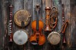 © Елена Григорова - Collection of classical musical instruments against a wooden background, violin, clarinet, bassoon, and bodhran, copy space