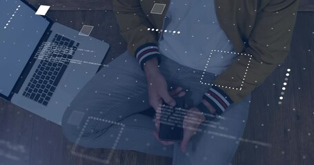 Poster - Animation of financial data processing over caucasian businessman using smartphone