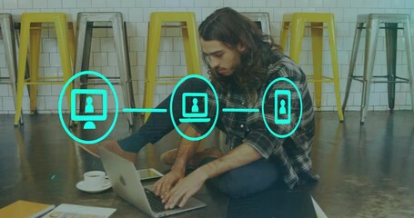 Poster - Animation of media icons over caucasian man using laptop