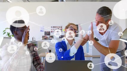 Poster - Animation of network of connections with icons over diverse business people high fiving in office