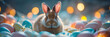 Cute bunny or rabbit with Easter eggs against blurred lighting backdrop  Happy Easter concept.