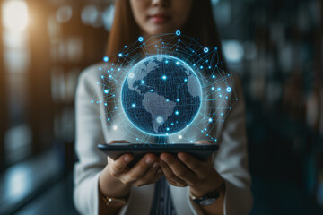 Poster - Close-up of hands holding a digital tablet with a glowing earth network, symbolizing global connectivity and business.