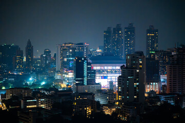 Wall Mural - Bangkok skyline view at night from a rooftop restaurant, Bangkok Thailand