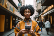 African Woman With Smartphone Vacationing in Tokyo