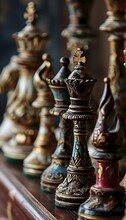 A Group Of Chess Pieces Sitting On Top Of A Wooden Table