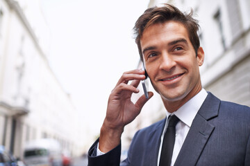 Canvas Print - Phone call, smile and business man in city for corporate, communication and contact. Networking, technology and conversation with male employee in outdoors for feedback, planning and chat