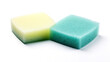 © Dilshad - Two scouring pads up close against a blank white background.