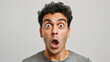 shocked man with wide eyes and an open mouth, giving an exaggerated expression of surprise or disbelief.