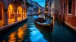 Venice canal with gondola at night, Italy. Long exposure.