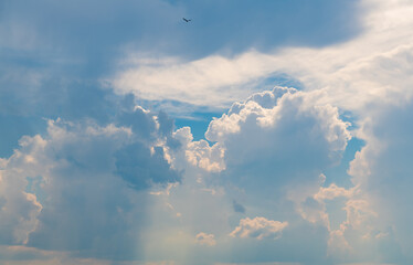 Wall Mural - beautiful big white clouds in the blue sky during sunset time