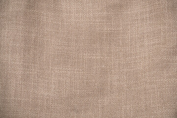 Wall Mural - hessian sackcloth woven jute burlap fabric cloth textile texture pattern background in brown beige a