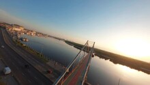 FPV, Pedestrian Bridge At Kyiv City . Bridge Over Dnipro River, Golden Hour, Drone Aerial View Kyiv Pedestrian Bridge, Truchaniv Island And Dnieper River On A Beautiful Sunny Day. Capital Of Ukraine