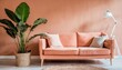 peach fuzz trendy color of 2024 year concept living room with sofa and green plant