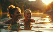 Happy female friends cold water swimming in a lake at golden hour.